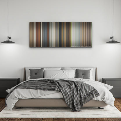 The Harder They Fall color palette canvas above a bed, between two black pendant lamps