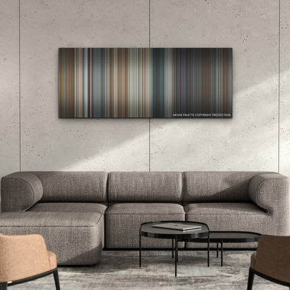 Scream color palette canvas on a concrete wall above a gray sectional sofa