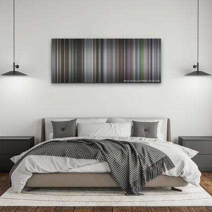 The Worst Person in the World color palette canvas above a bed, between two black pendant lamps