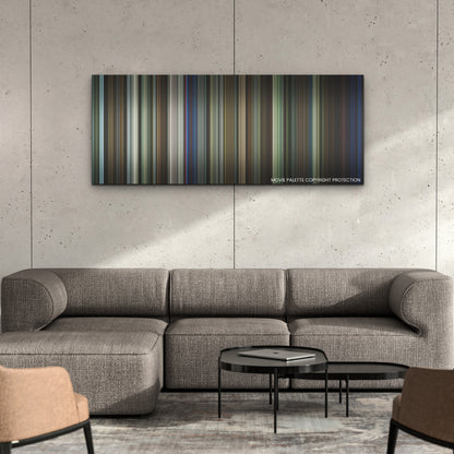 Candyman color palette canvas on a concrete wall above a gray sectional sofa