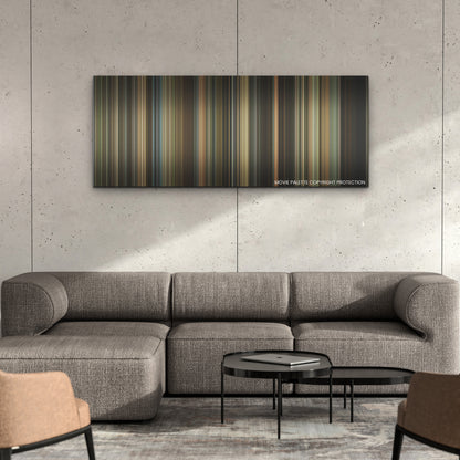 Ferrari color palette canvas on a concrete wall above a gray sectional sofa