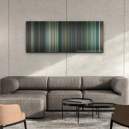 Infinite color palette canvas on a concrete wall above a gray sectional sofa