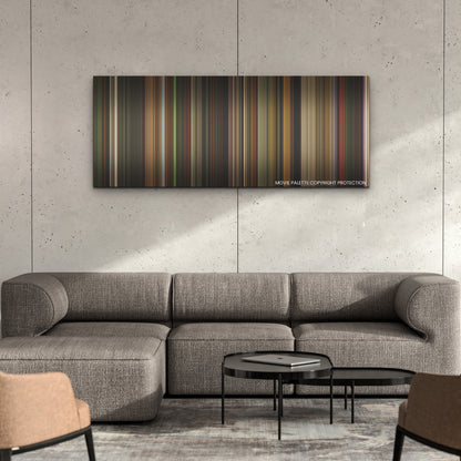 Love Lies Bleeding color palette canvas on a concrete wall above a gray sectional sofa