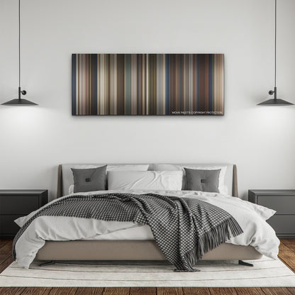 Monster Summer color palette canvas above a bed, between two black pendant lamps