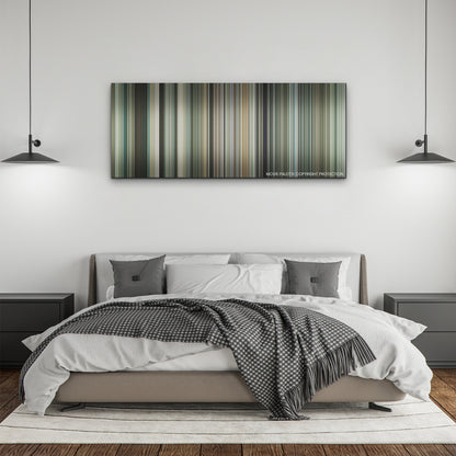 Guy Ritchie's the Covenant color palette canvas above a bed, between two black pendant lamps