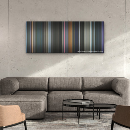 Smile 2 color palette canvas on a concrete wall above a gray sectional sofa