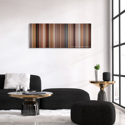 Talk To Her color palette canvas above a black sofa with a gold-topped table