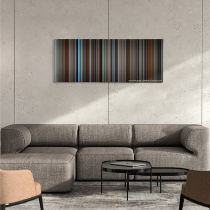 Insomnia color palette canvas on a concrete wall above a gray sectional sofa