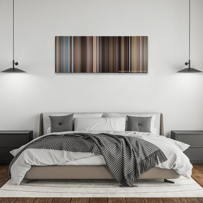 You've Got Mail color palette canvas above a bed, between two black pendant lamps
