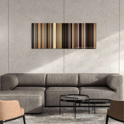 Safe Haven color palette canvas on a concrete wall above a gray sectional sofa