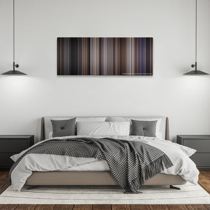 Ronin color palette canvas above a bed, between two black pendant lamps