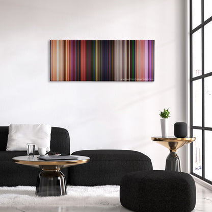 Onward color palette canvas above a black sofa with a gold-topped table