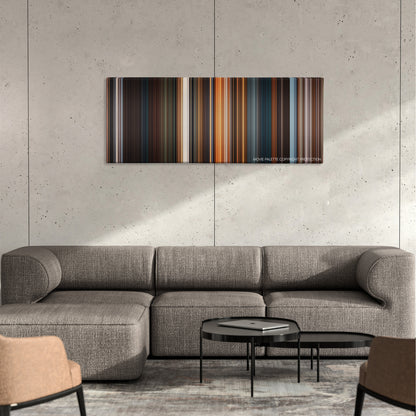 A Christmas Carol color palette canvas on a concrete wall above a gray sectional sofa