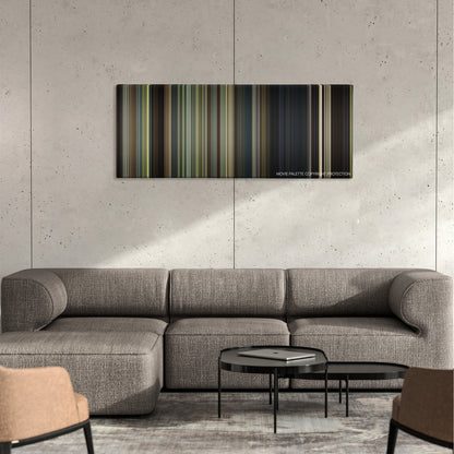 Ride Along color palette canvas on a concrete wall above a gray sectional sofa