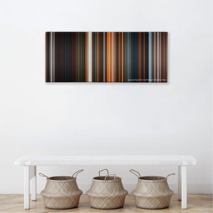 A Christmas Carol color palette canvas above a white bench with three woven baskets