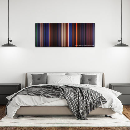 Mortal Kombat color palette canvas above a bed, between two black pendant lamps