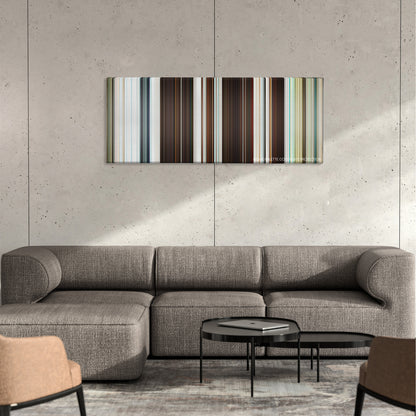 Triangle color palette canvas on a concrete wall above a gray sectional sofa