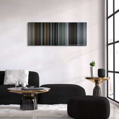 The Gift color palette canvas above a black sofa with a gold-topped table
