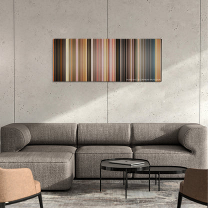 The Three Musketeers color palette canvas on a concrete wall above a gray sectional sofa