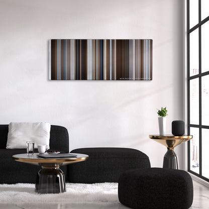Fargo color palette canvas above a black sofa with a gold-topped table