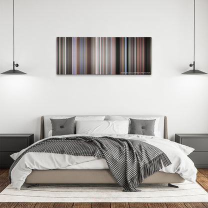 To Catch a Thief color palette canvas above a bed, between two black pendant lamps