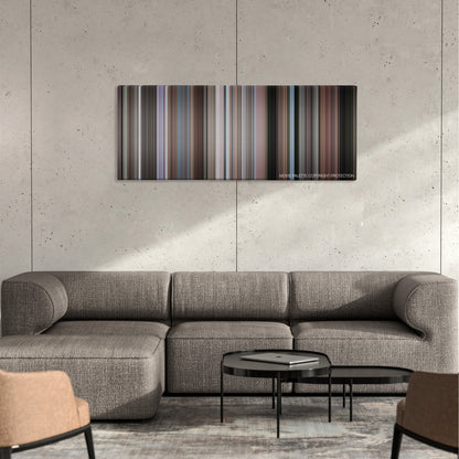 To Catch a Thief color palette canvas on a concrete wall above a gray sectional sofa