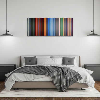 Hero color palette canvas above a bed, between two black pendant lamps