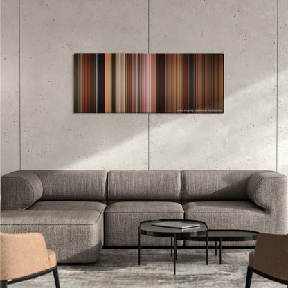 Shrek the Third color palette canvas on a concrete wall above a gray sectional sofa