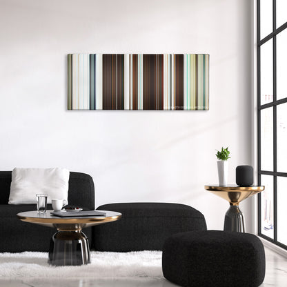 Triangle color palette canvas above a black sofa with a gold-topped table