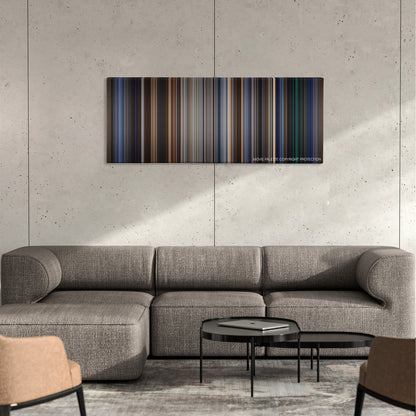 Patriot Games color palette canvas on a concrete wall above a gray sectional sofa