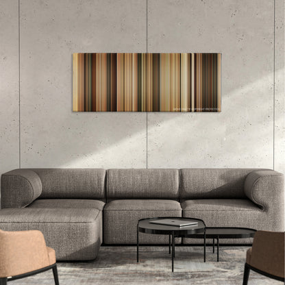 Get the Gringo color palette canvas on a concrete wall above a gray sectional sofa