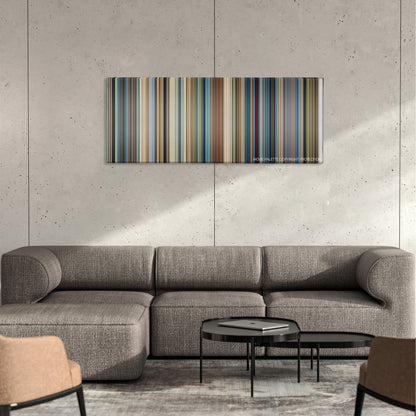 The Diving Bell and the Butterfly color palette canvas on a concrete wall above a gray sectional sofa