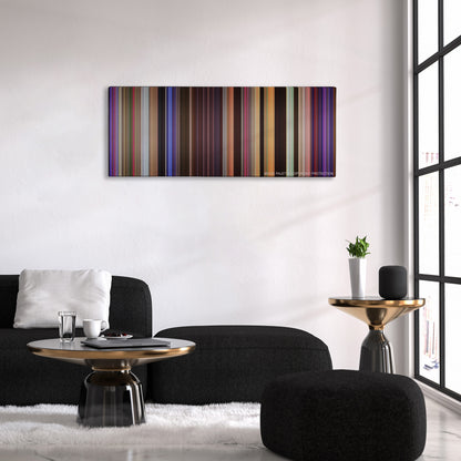 Pitch Perfect 2 color palette canvas above a black sofa with a gold-topped table