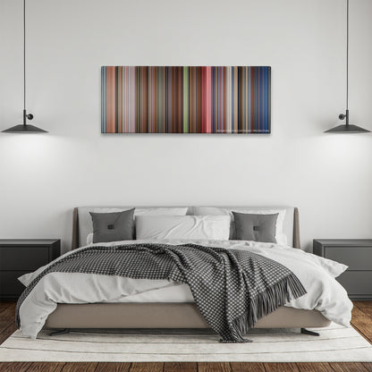 The Shining color palette canvas above a bed, between two black pendant lamps