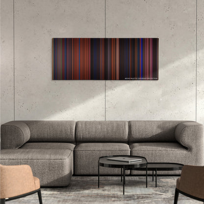 Moulin Rouge! color palette canvas on a concrete wall above a gray sectional sofa