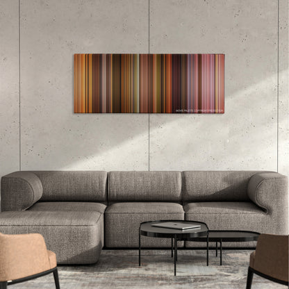 Dancer in the Dark color palette canvas on a concrete wall above a gray sectional sofa