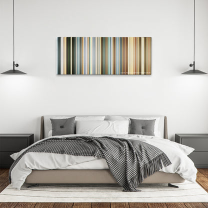 The Mexican color palette canvas above a bed, between two black pendant lamps