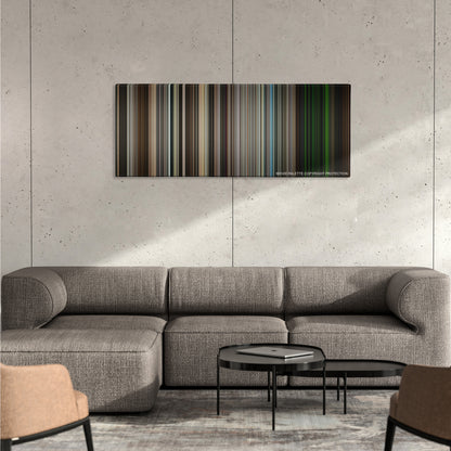 Zero Dark Thirty color palette canvas on a concrete wall above a gray sectional sofa