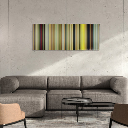 Kong: Skull Island color palette canvas on a concrete wall above a gray sectional sofa