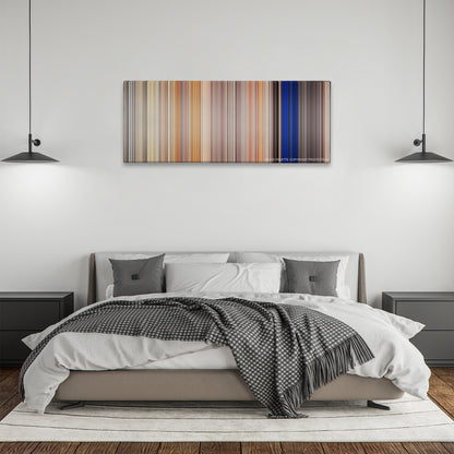 Clerks II color palette canvas above a bed, between two black pendant lamps