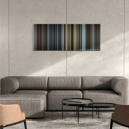Snow White and the Huntsman color palette canvas on a concrete wall above a gray sectional sofa