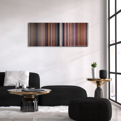 Dumb and Dumber color palette canvas above a black sofa with a gold-topped table