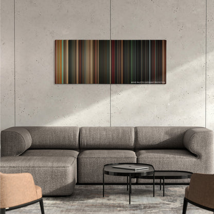 Angels & Demons color palette canvas on a concrete wall above a gray sectional sofa