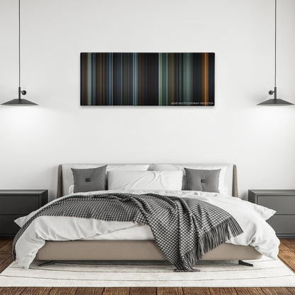 The Wolfman color palette canvas above a bed, between two black pendant lamps
