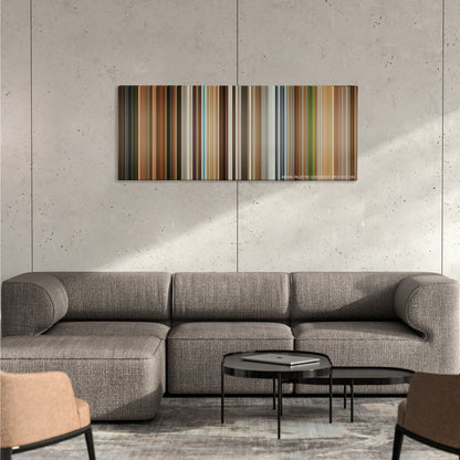 Kingsman: The Golden Circle color palette canvas on a concrete wall above a gray sectional sofa
