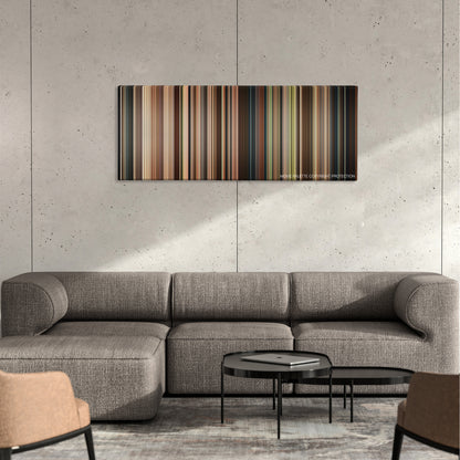 Marie Antoinette color palette canvas on a concrete wall above a gray sectional sofa