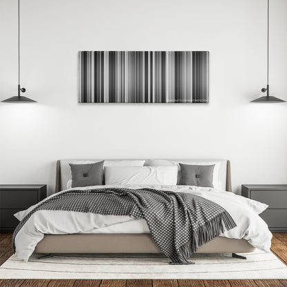 Seven Samurai color palette canvas above a bed, between two black pendant lamps