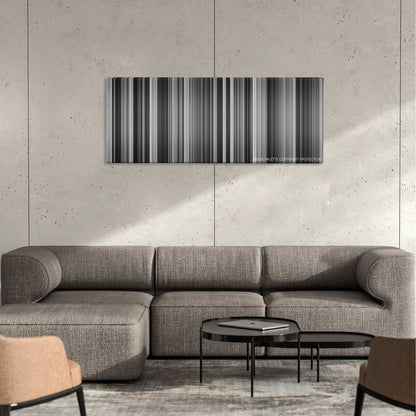 Seven Samurai color palette canvas on a concrete wall above a gray sectional sofa