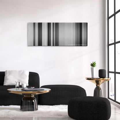 To Kill a Mockingbird color palette canvas above a black sofa with a gold-topped table