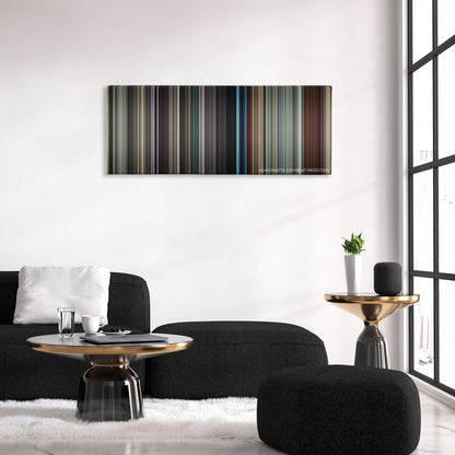 Stoker color palette canvas above a black sofa with a gold-topped table